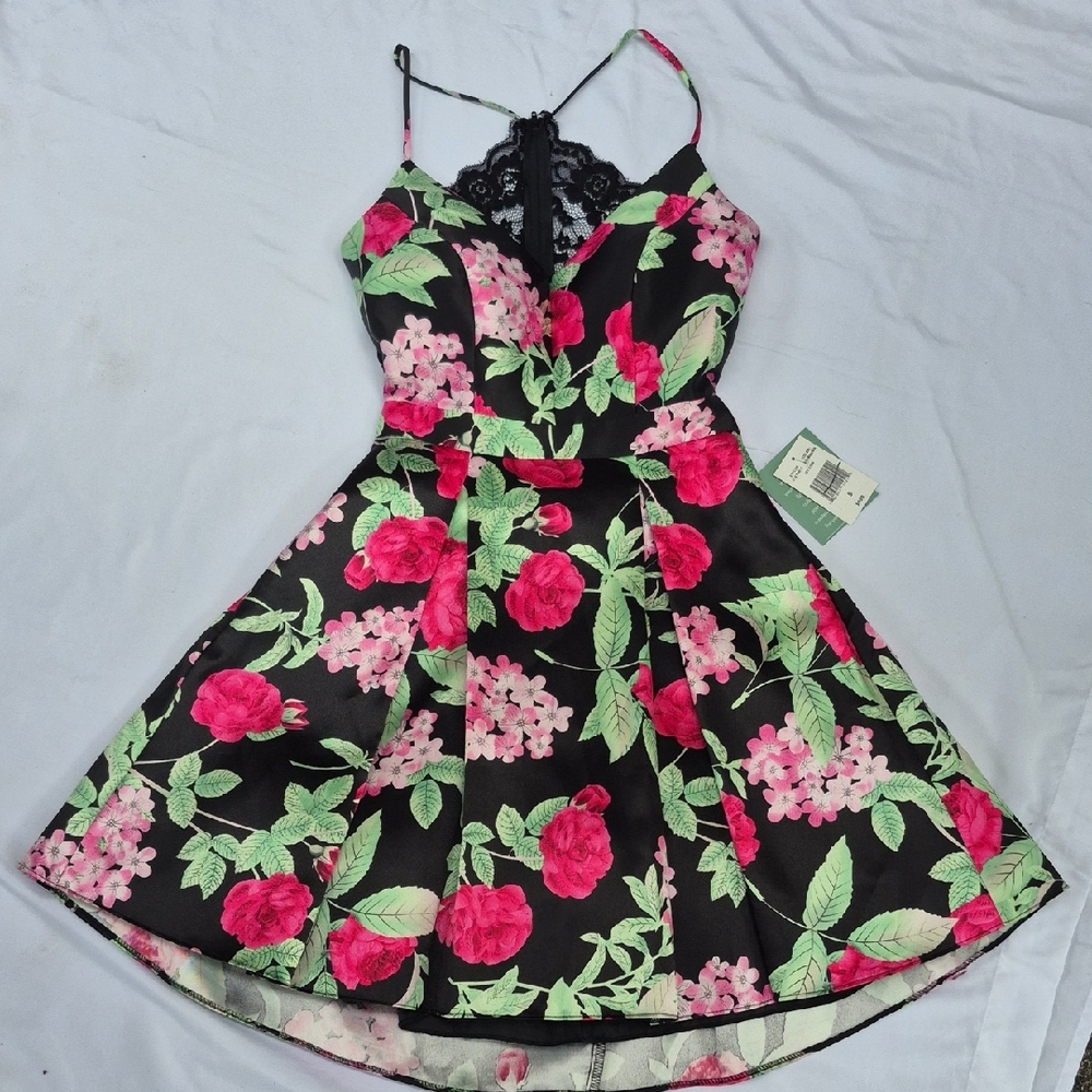 B. Smart Black Dress with Pink Floral Design